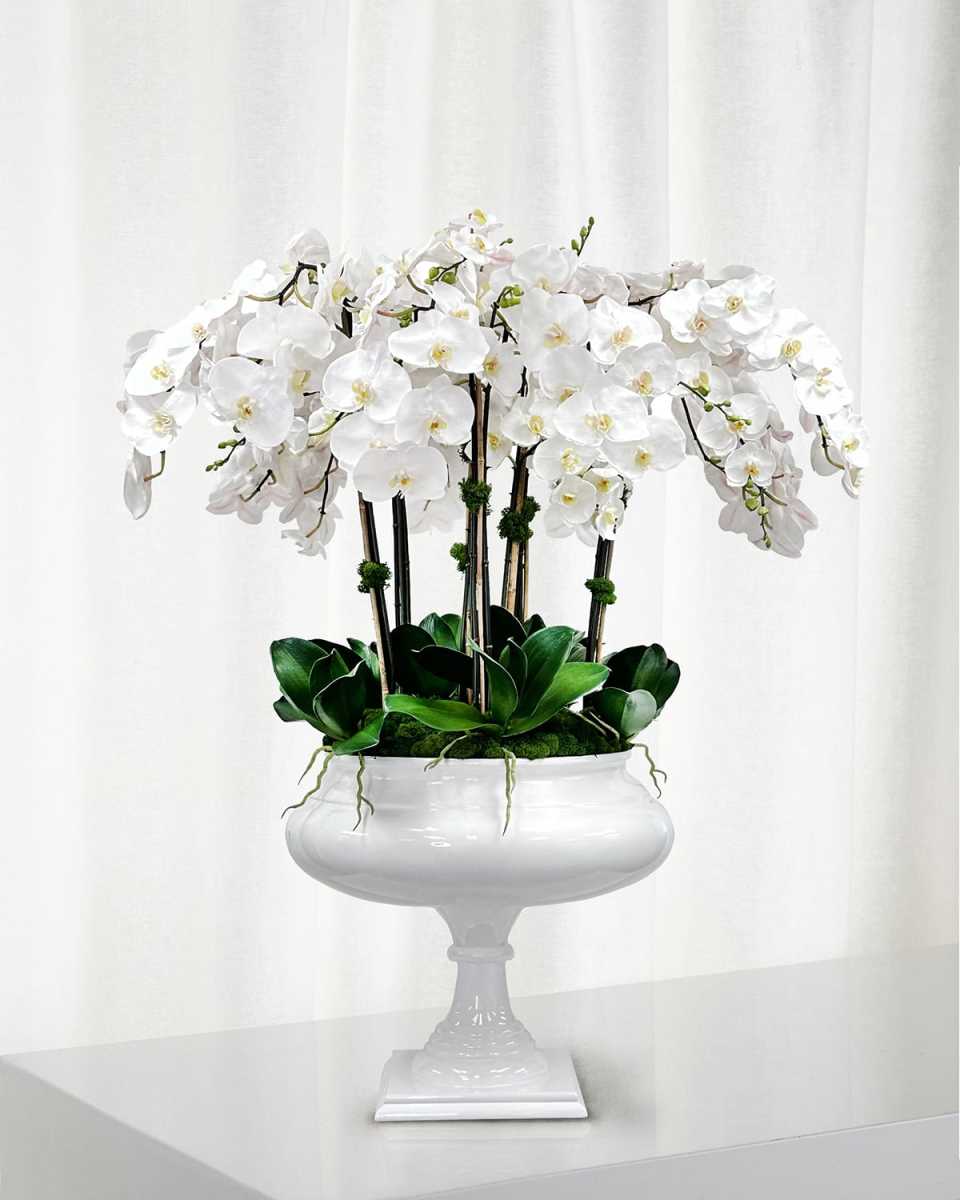 Orchid 47" Faux Floral Arrangement in Footed Roman Planter